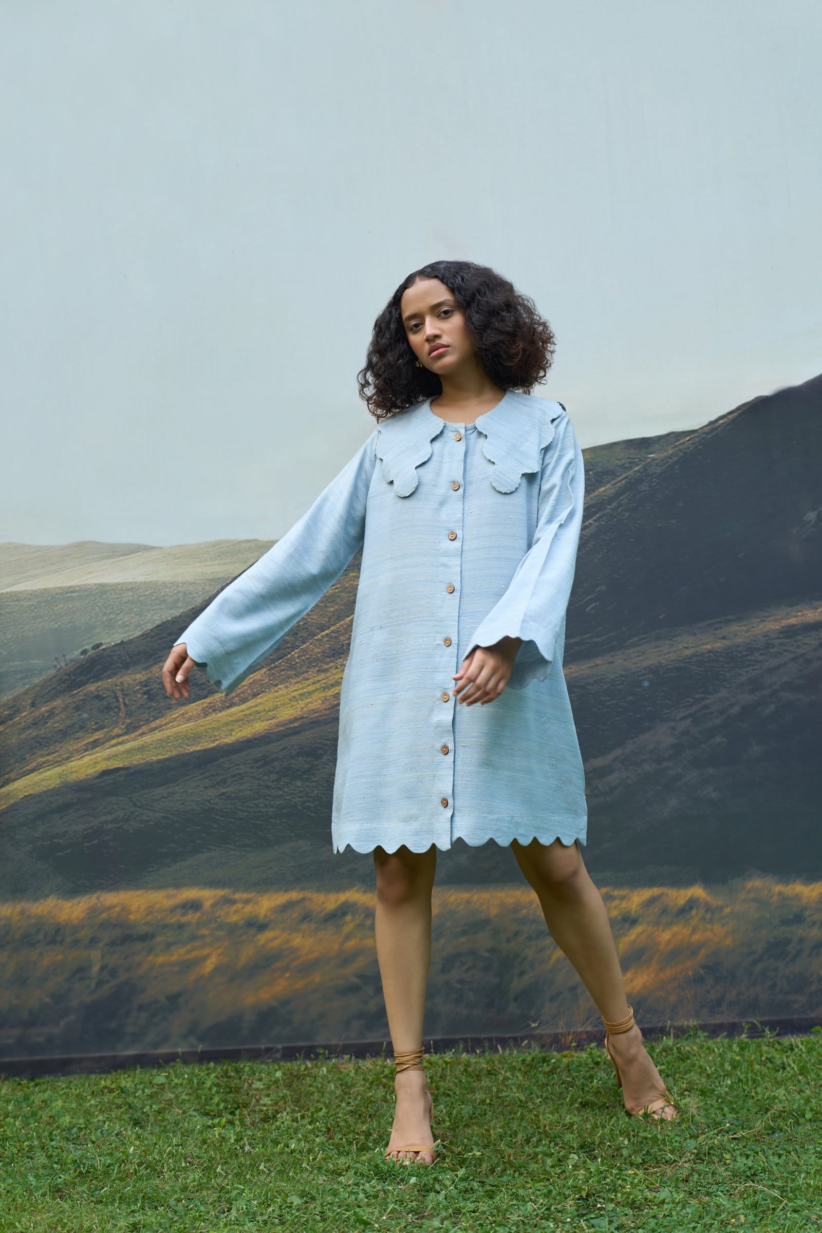 Alternative petal scallop short dress featuring a flowy fabric and scalloped hem, perfect for casual or summer wear.