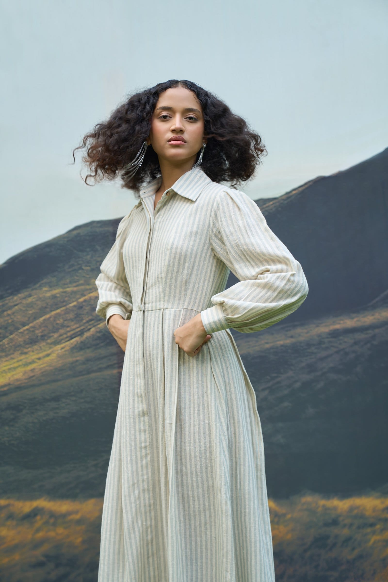 Alternative Daze maxi dress featuring a flowing design and floral pattern, shown in a close-up of the fabric and style details.
