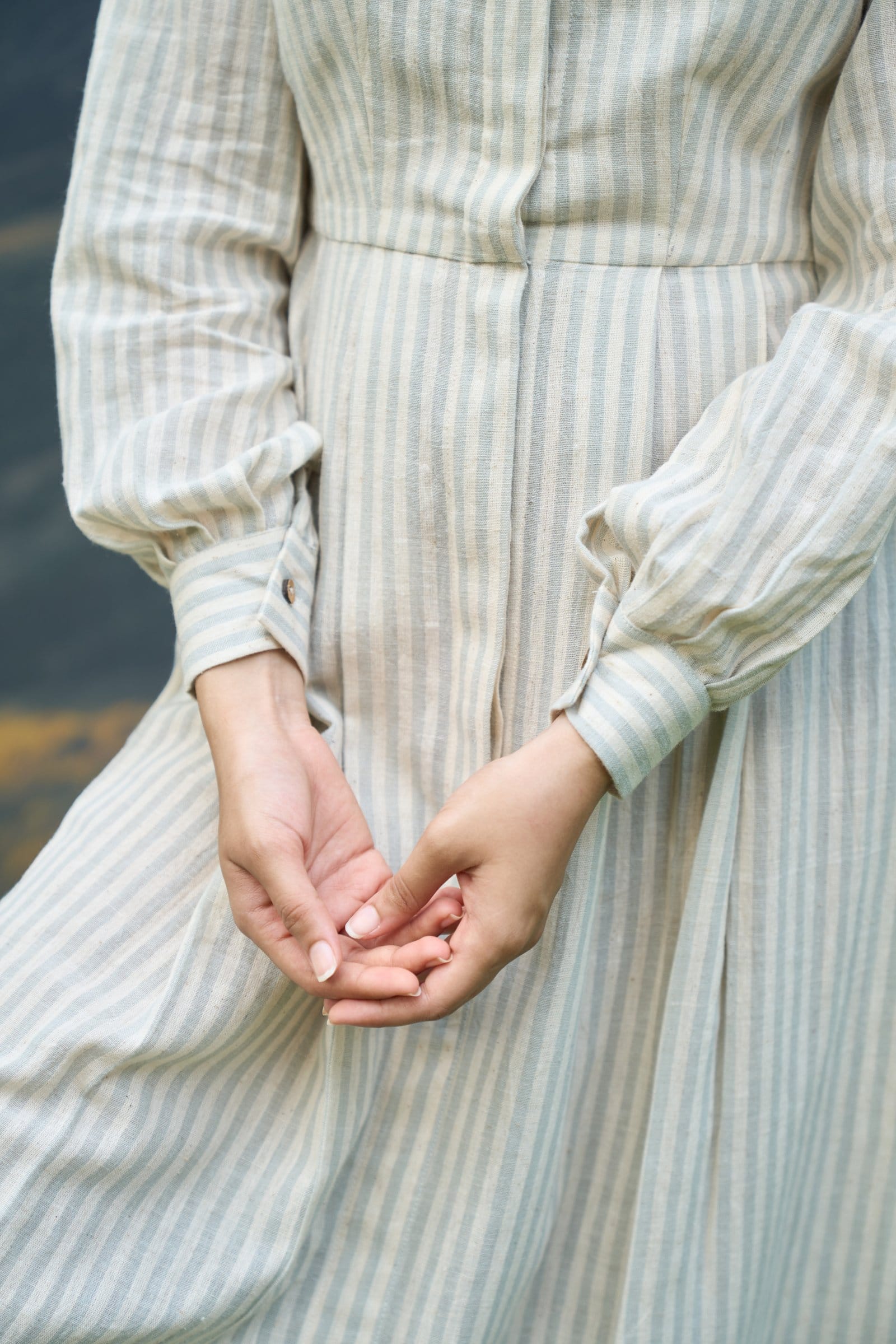 Alternative Daze maxi dress with flowing fabric and floral pattern, shown in a close-up view highlighting the design details.