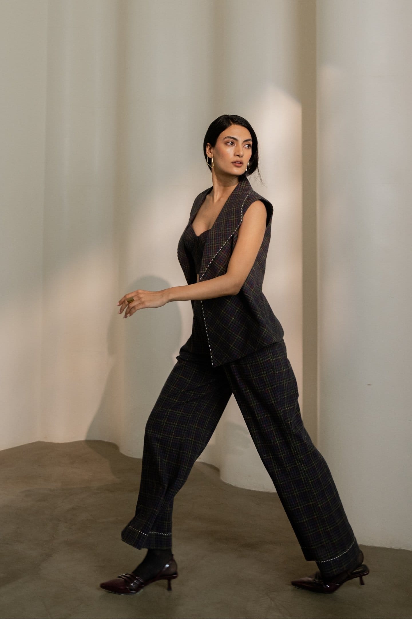 Black Prism trousers by Alternative featuring colorful check pattern, stylish and comfortable for casual or office wear.