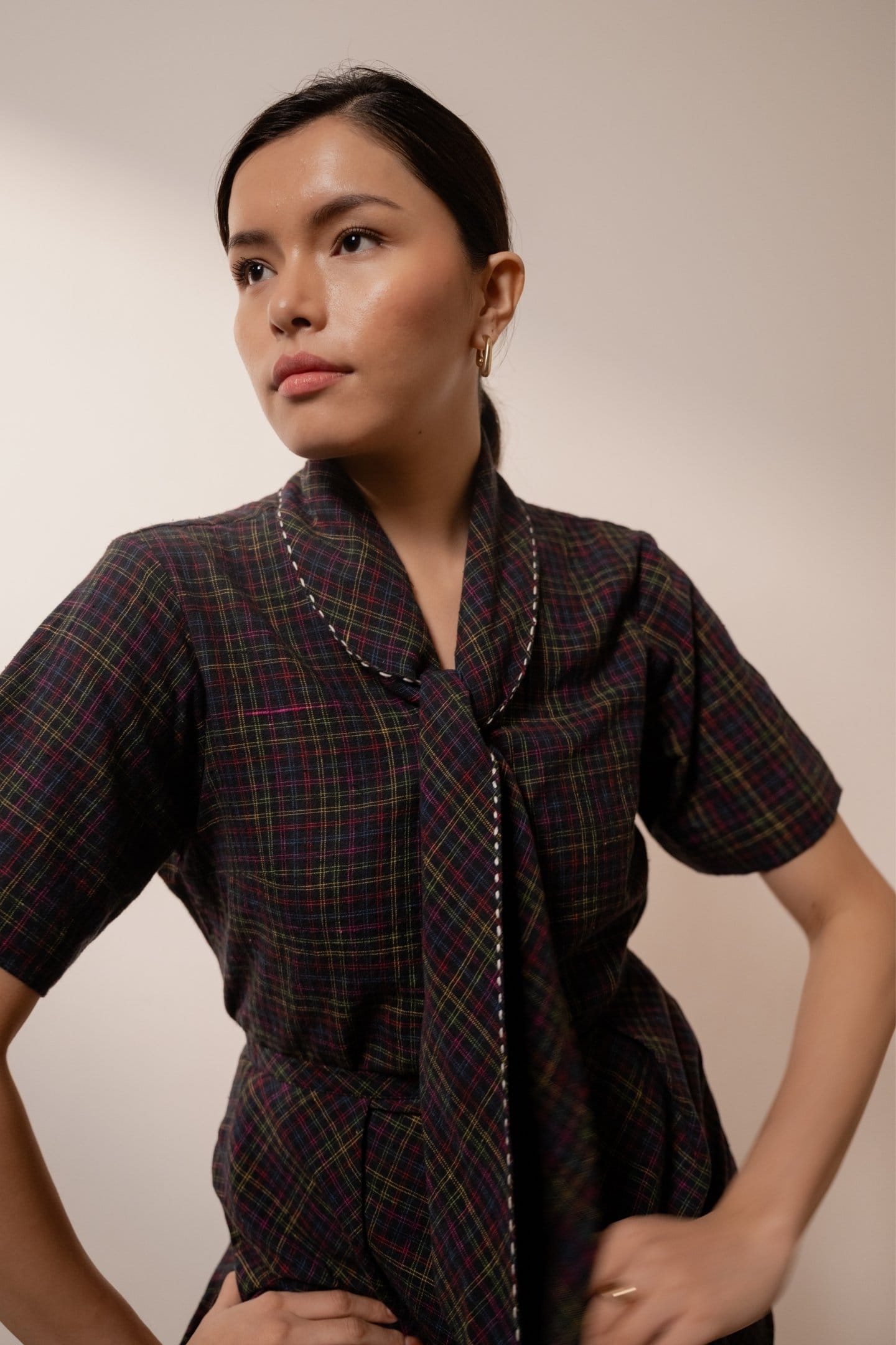 Black Prism tie-up top by Alternative with colorful checkered pattern, featuring a fashionable and trendy design.