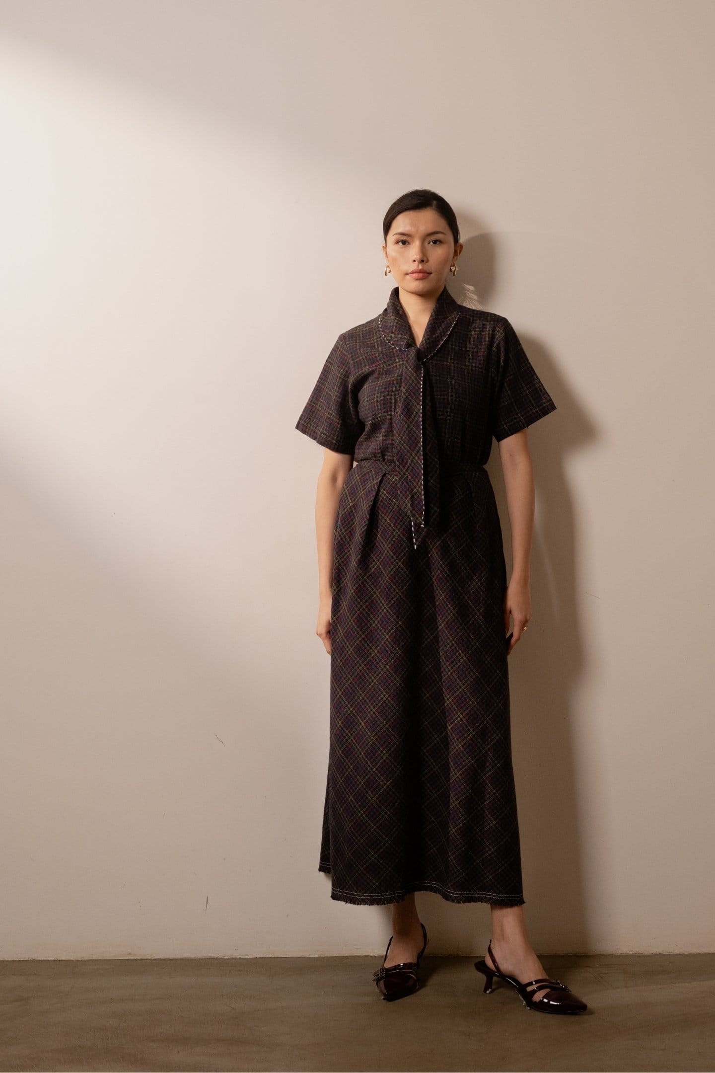 Black Prism skirt by Alternative featuring colorful checkered pattern and a stylish, modern design.