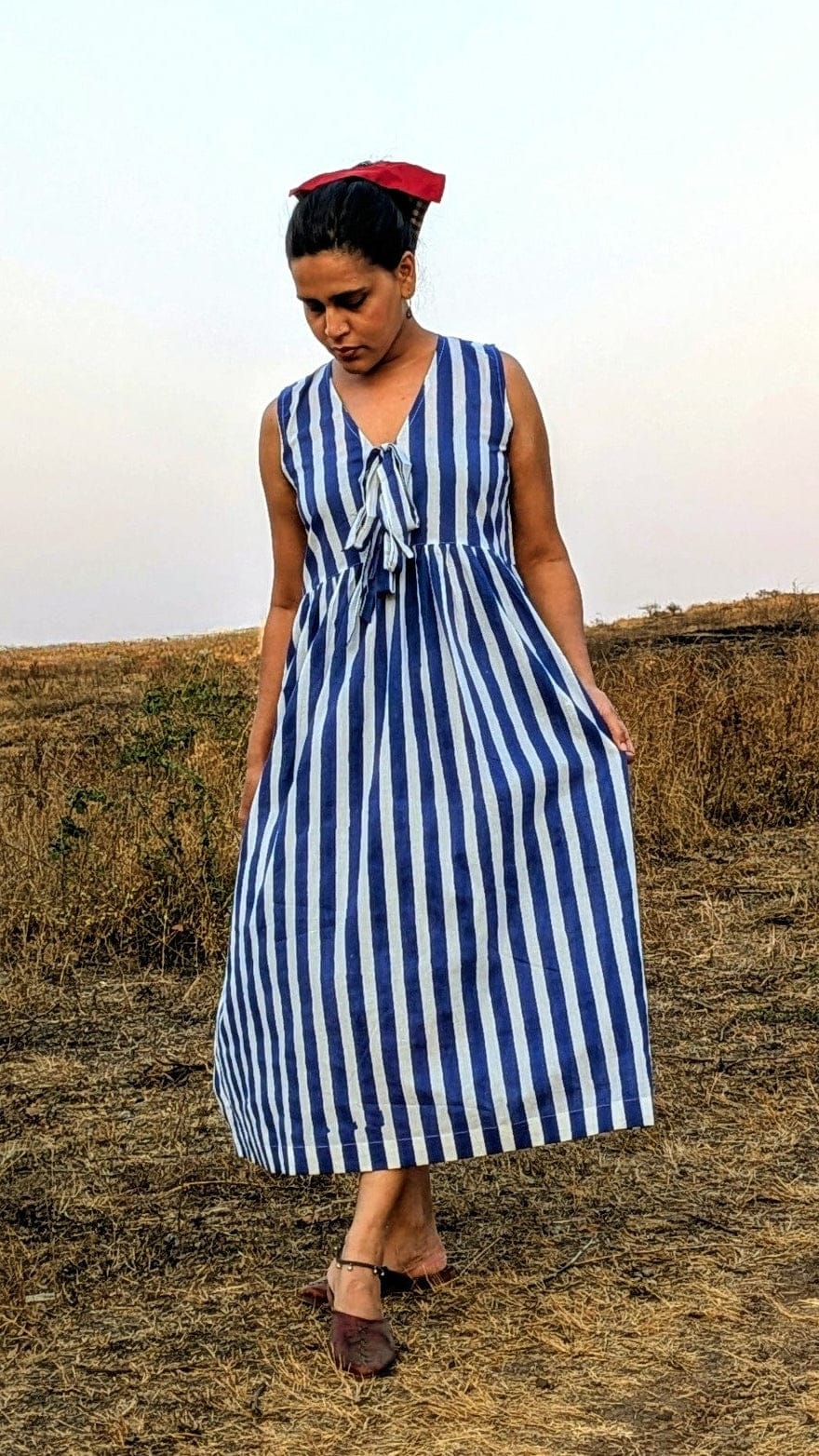 Deeta Kylo dress featuring a stylish design with flowing fabric and intricate details, perfect for elegant occasions.
