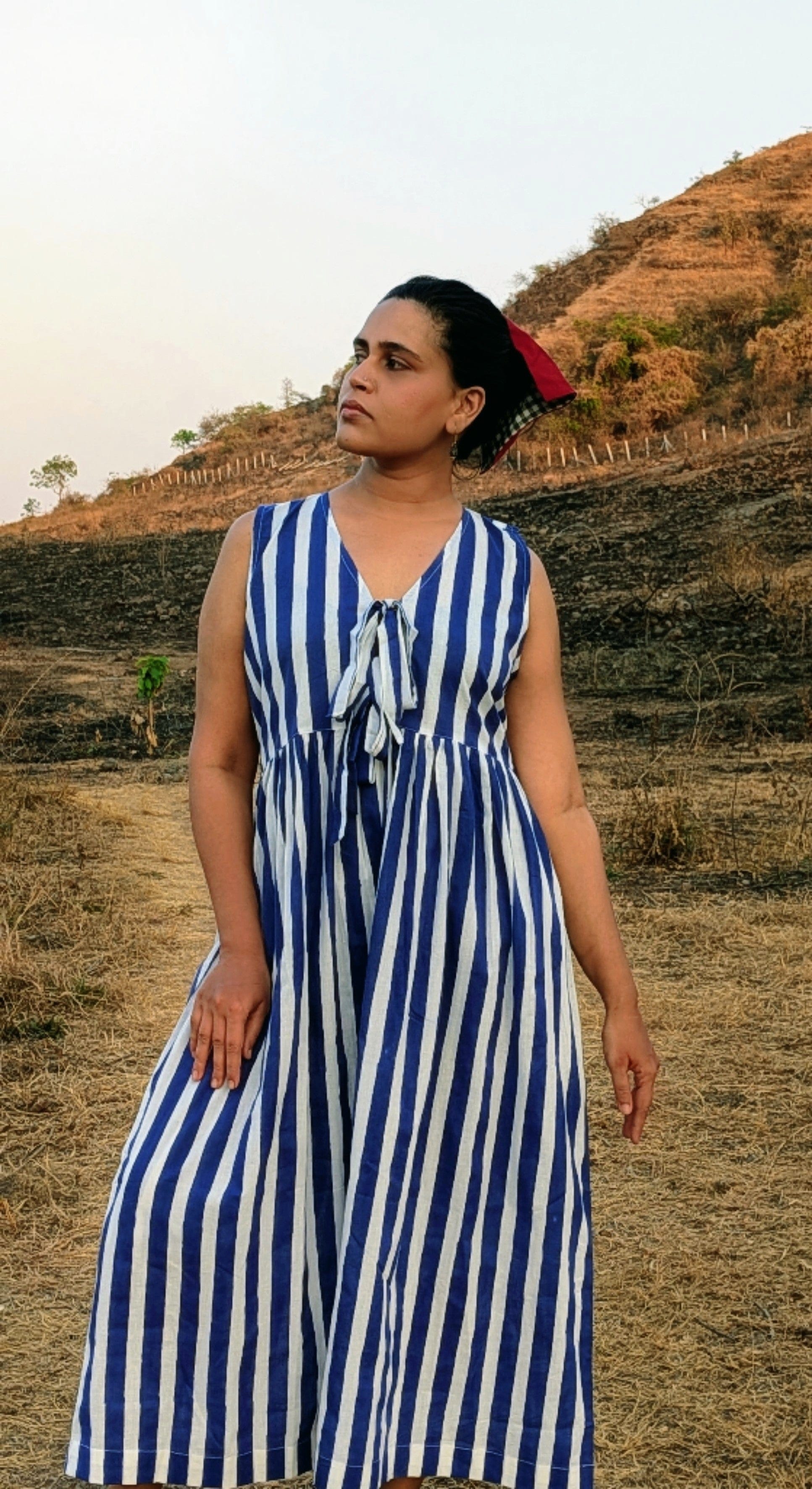 Deeta Kylo dress displayed on a hanger, featuring a stylish design with a fitted bodice and flowing skirt for elegant wear.