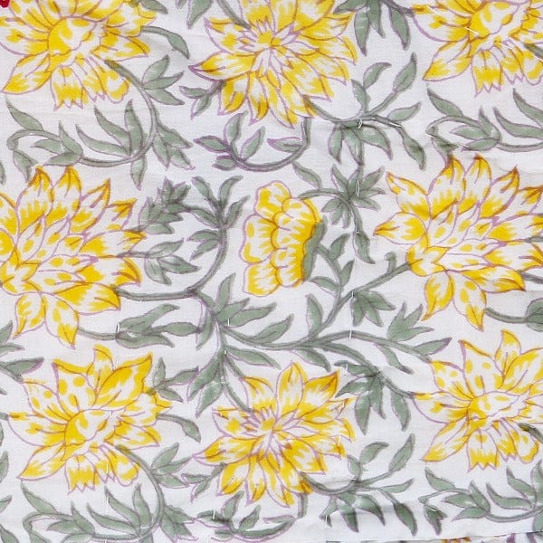 Reversible Sunnie chintz floral quilt in yellow with block print design, perfect for living room decor, by Bombaybirds.