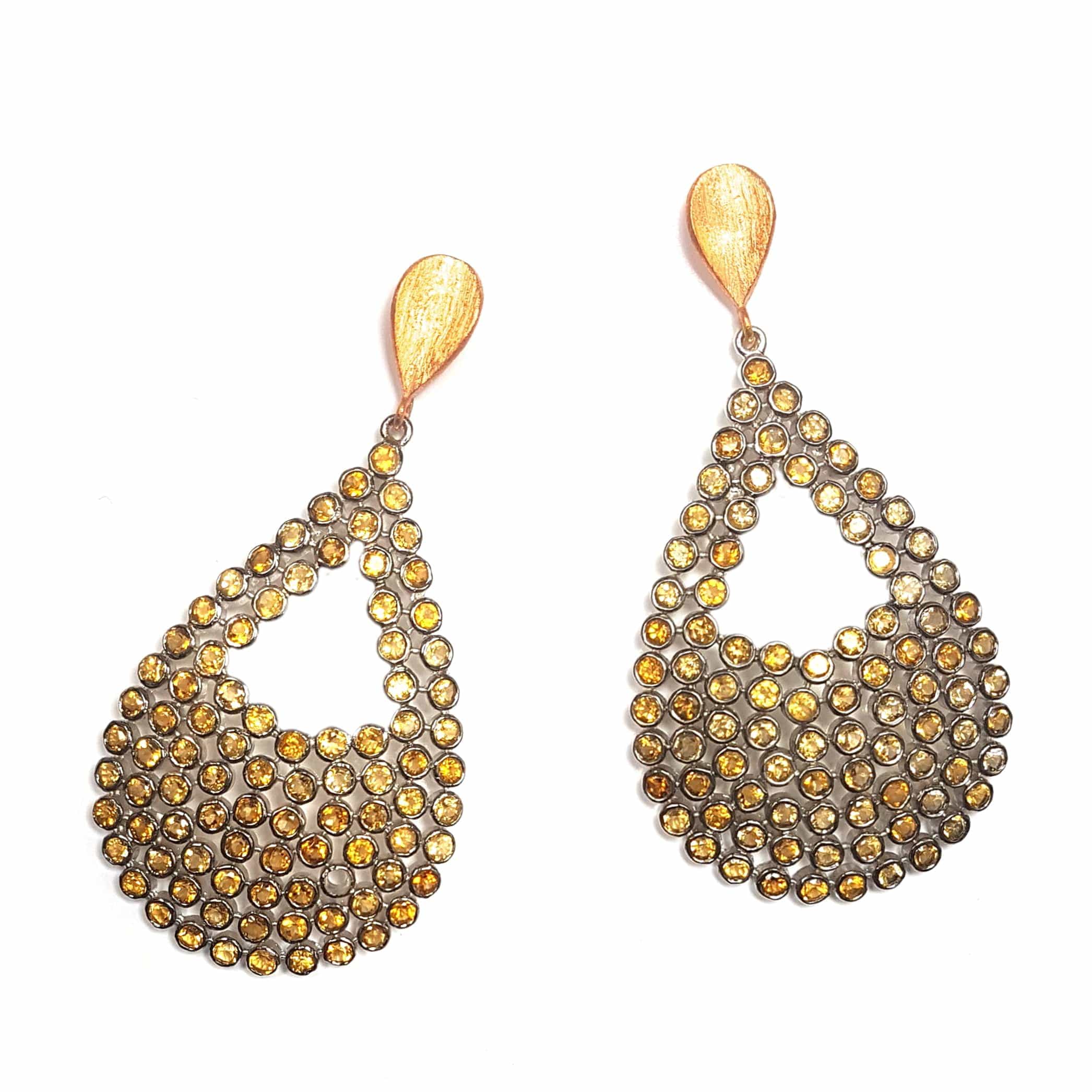 Ofelia earrings by Bombaybirds featuring gold-tone hoops with turquoise topaz stones, shown on a white background.